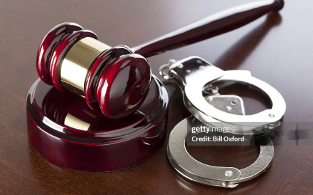 Four Charged with the Murder of Dr. Olila